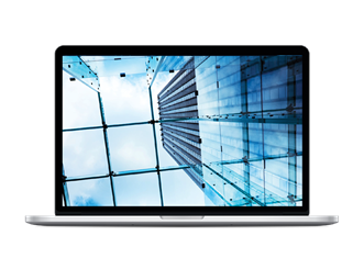 Laptop displaying an upward view of a tall office building